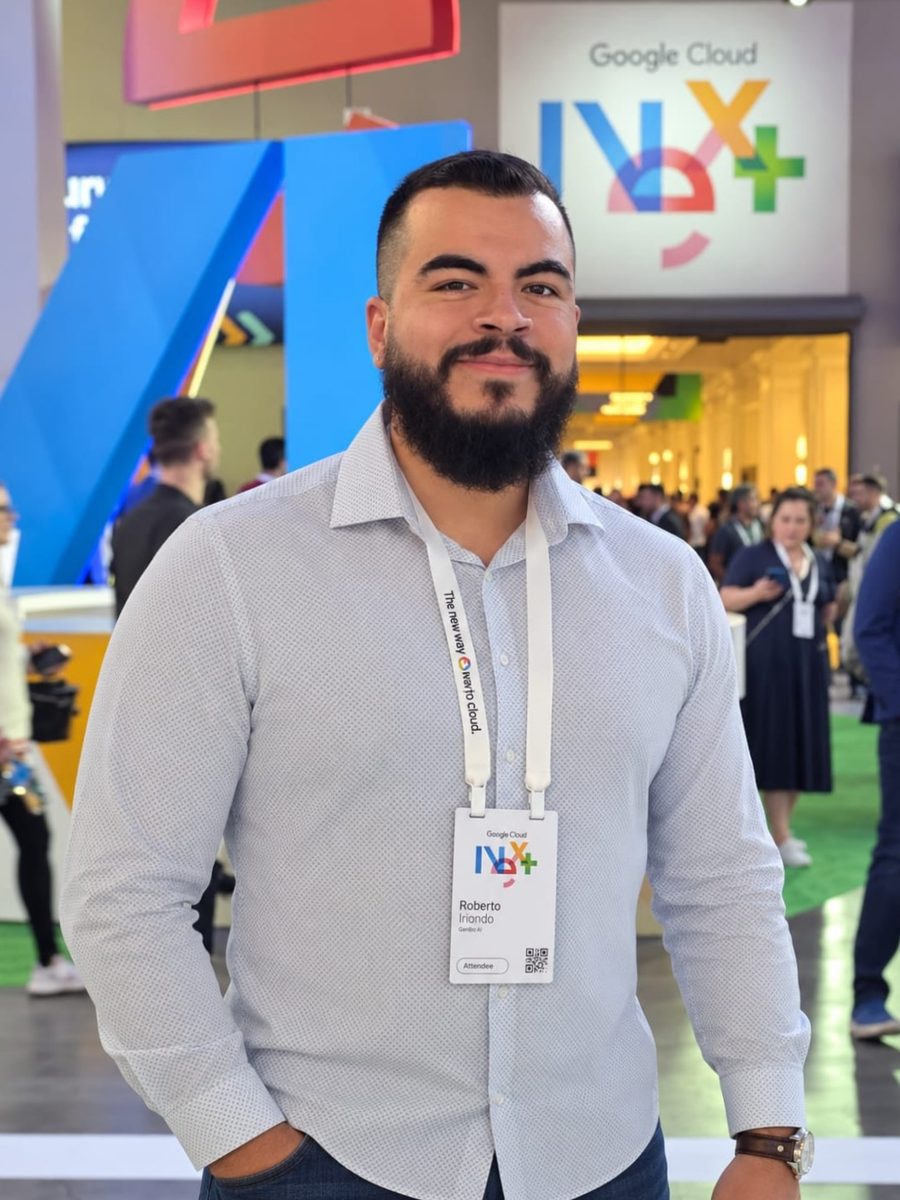 Roberto Iriondo wearing his attendee badge at the Google Cloud Next conference in Las Vegas, where he represented GenBio AI as its marketing lead